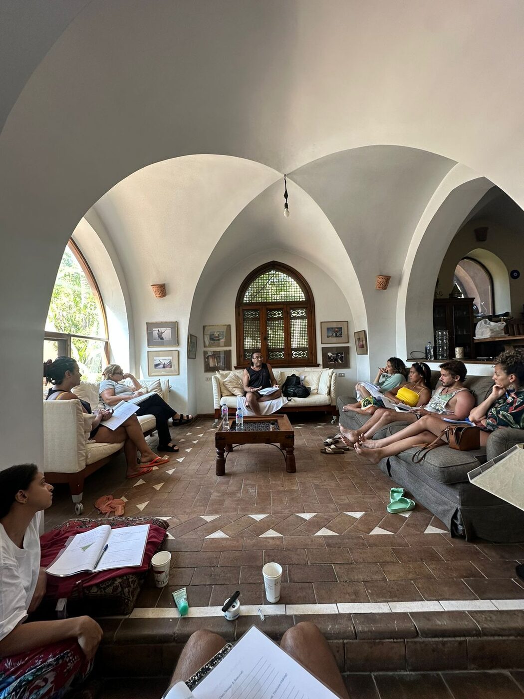 Students attending a classroom lecture with Karim Strougo